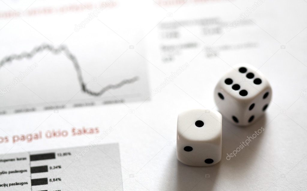 White dices over stock market graphs