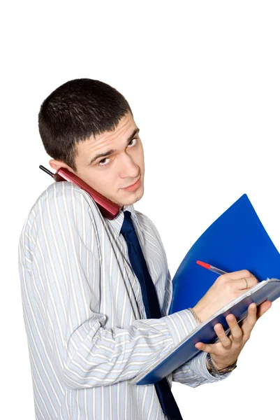 The young man speaks by phone — Stock Photo, Image