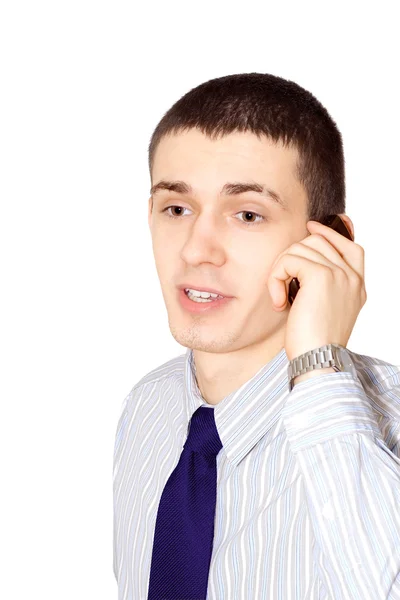 O jovem fala ao telefone — Fotografia de Stock
