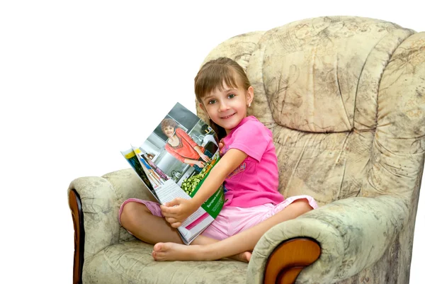 Dziewczyna w fotel — Zdjęcie stockowe