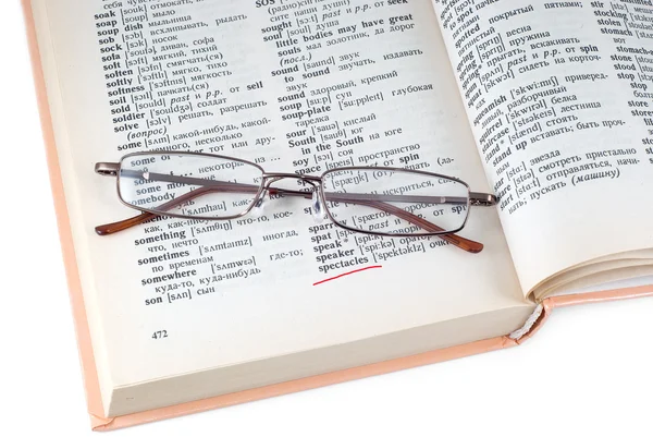 The dictionary and spectacles — Stock Photo, Image