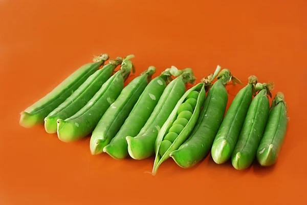 Set of Green peas vegetable on orange ba — Stock Photo, Image