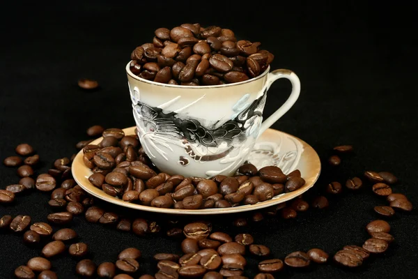 stock image Coffee beans in a cup of oriental style