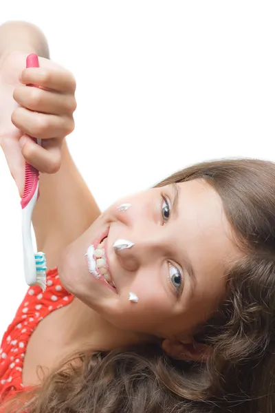 Belleza adolescente chica limpia dientes aislados en blanco — Foto de Stock