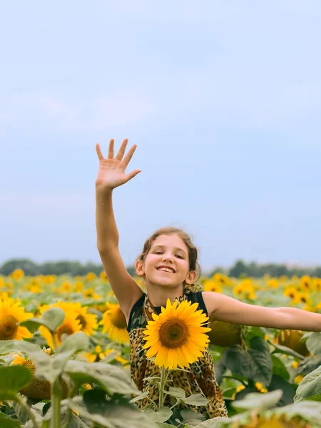 Beauty teen girl with sunflower — Stock Photo, Image