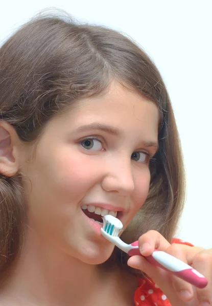 Chica con cepillo de dientes aislado en blanco —  Fotos de Stock