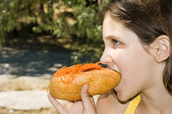 stock image Fun girl eat hot-dog