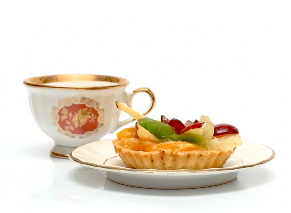 Kopje thee en gebak in plaat — Stockfoto