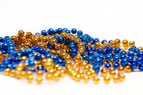 Blauwe en gouden decoratie kralen — Stockfoto