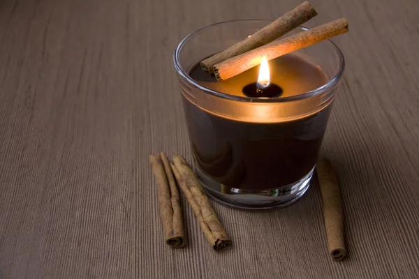 Candle and Cinnamon — Stock Photo, Image