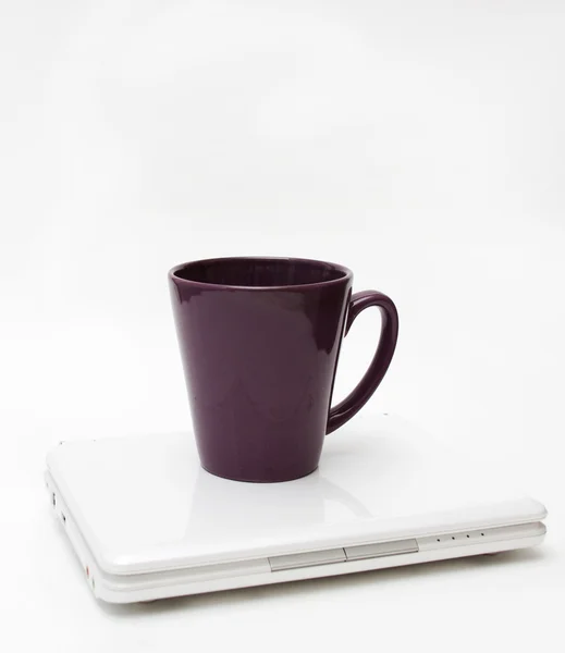 stock image White Laptop and Purple Cup