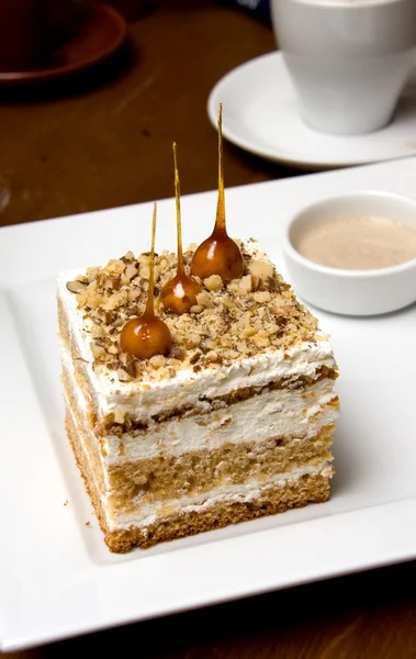 Cubic Sandwiched Cake with Caramel Decoration — Stock Photo, Image