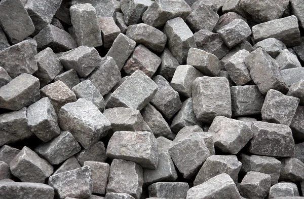 Montón de bloques grises para pavimentar —  Fotos de Stock
