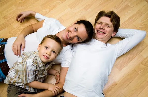 Familjen på ett golv — Stockfoto