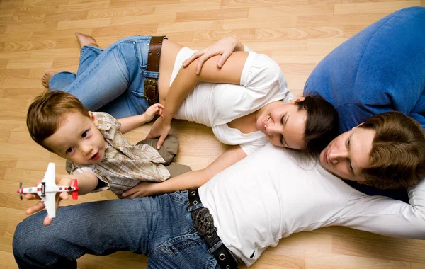 Family on a floor — Stock Photo, Image