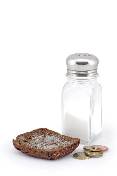 Brood met zout en munten. Stockfoto