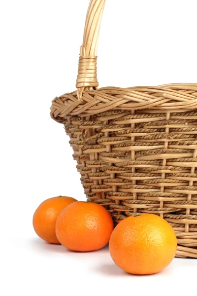 Tangerines on a background of a basket. — Stock Photo, Image