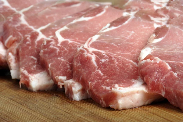 Slices of pork. Stock Image