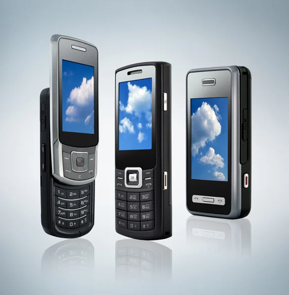 stock image Three different types of mobile phones