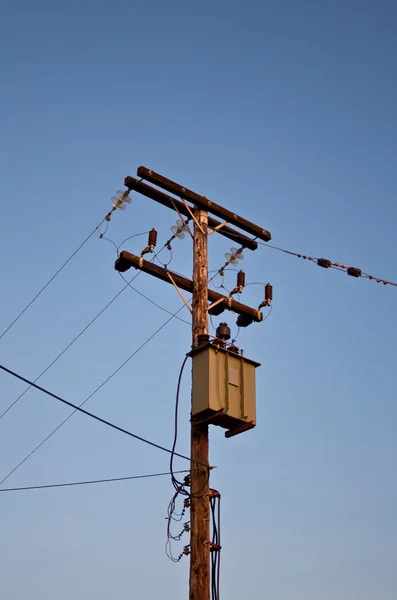 Wooden electrical pylon — Stock Photo, Image