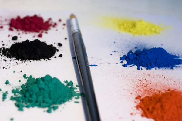 Pigments colors and paintbrush — Stock Photo, Image