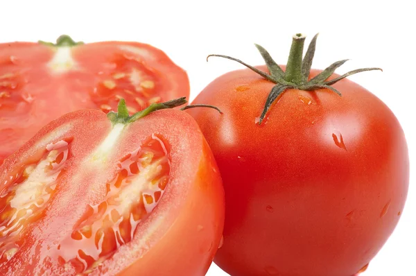 Tomaten: hele en snijd. — Stockfoto