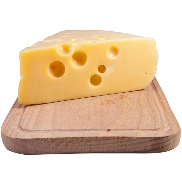 Sýr na dřevěném prkénku grunge. — Stock fotografie