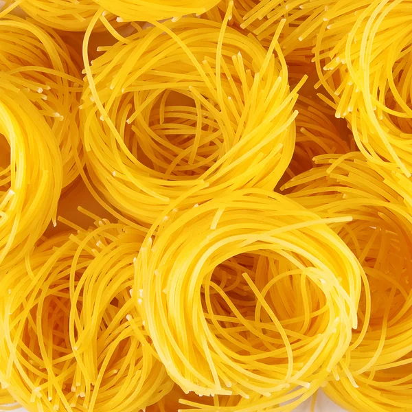 Italiaanse pasta als achtergrond. — Stockfoto