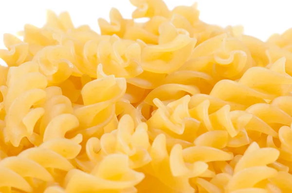 Gele mooi macaroni geïsoleerd — Stockfoto