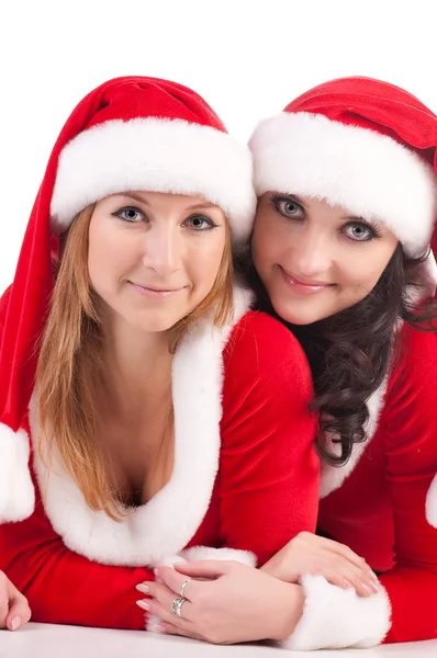 Två väninnor i christmass kostymer. — Stockfoto