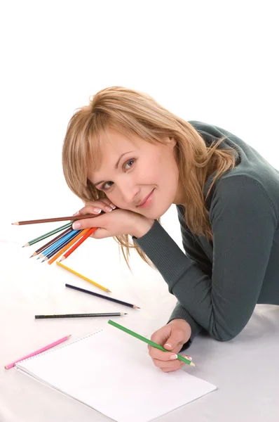 Beautiful young woman is going to draw. — Stock Photo, Image