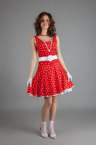Mooie vrouwen in rode jurk — Stockfoto