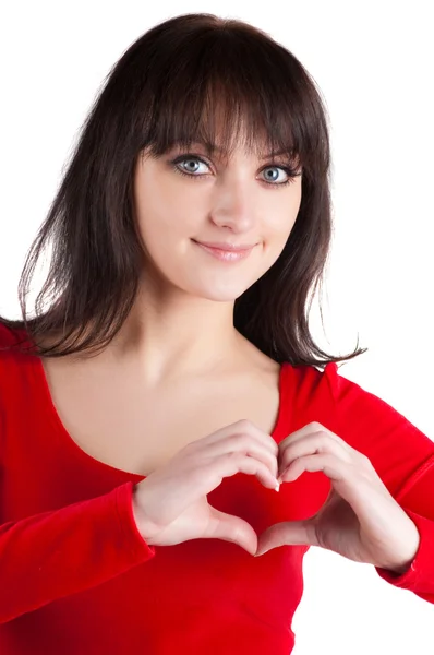 Kvinnan visar hjärtsymbol. — Stockfoto