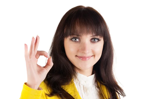 Young businesswoman doing the okay sign — Stock Photo, Image