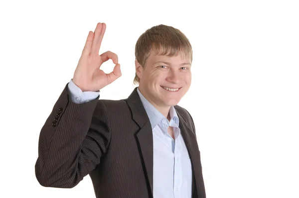 Uomo d'affari in abito presenta un segno OK — Foto Stock