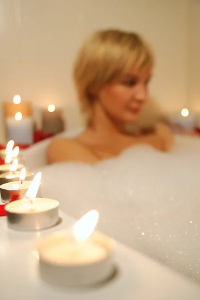 Nude woman in foamy bath — Stock Photo, Image