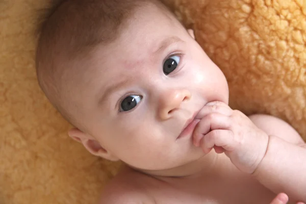 Cute baby on fur — Stock Photo, Image