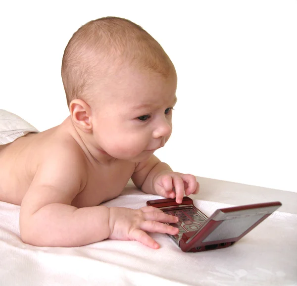 Baby playing with a smart phone — Stock Photo, Image