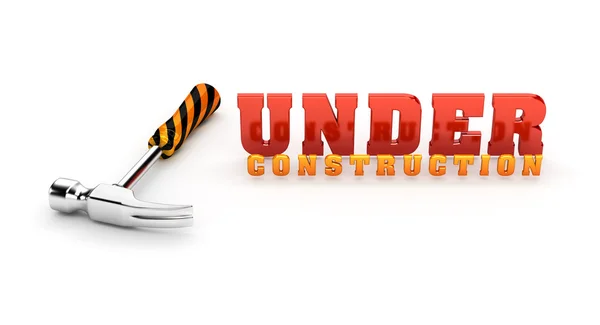 Under construction theme with a hammer — Stock Photo, Image