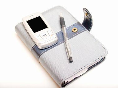 Office - Pen diary and a cell phone clipart