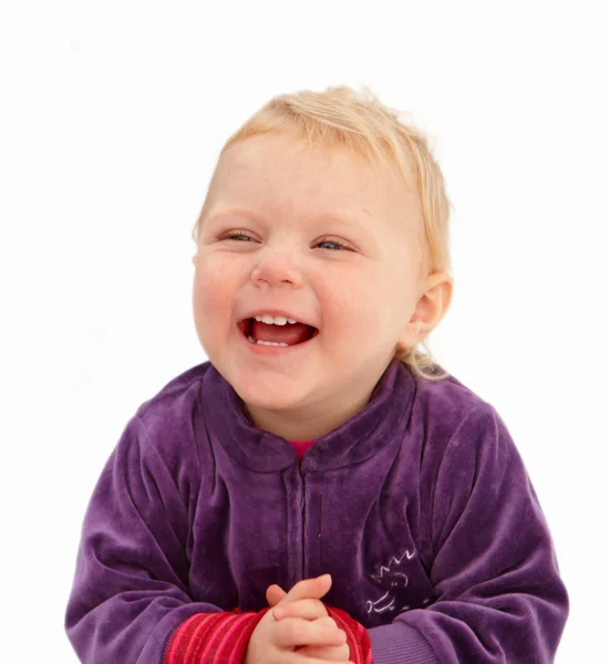 Roztomilá holčička s úsměvem na bílém pozadí — Stock fotografie