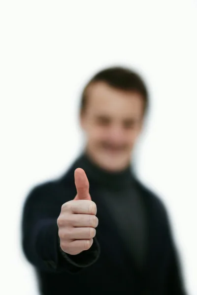 Young man giving thumbs up — Stock Photo, Image