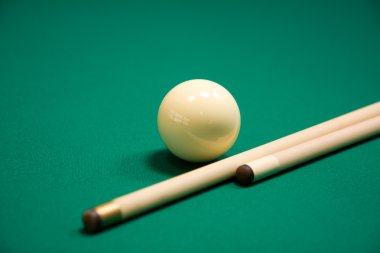 Billiard set on green table clipart