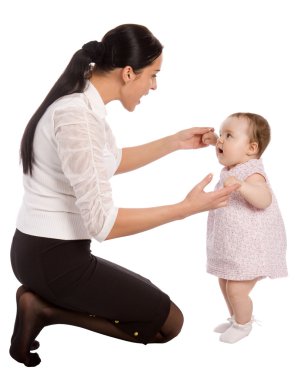 A mother teaches his daughter to speak clipart