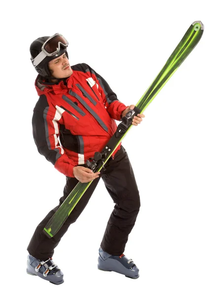 Skiër houden ski als rock gitaar — Stockfoto