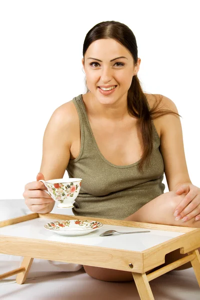 En gravid kvinna dricka te — Stockfoto
