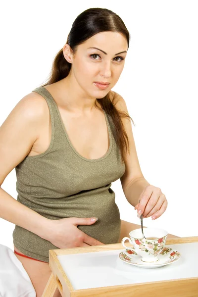 Szczęśliwa kobieta w ciąży, picie herbaty — Zdjęcie stockowe