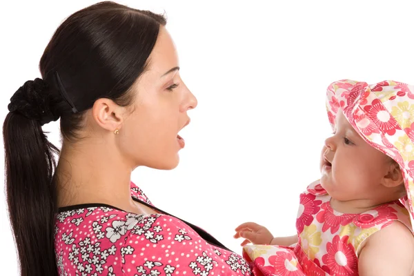 A mother teaches his daughter to speak — Stock Photo, Image