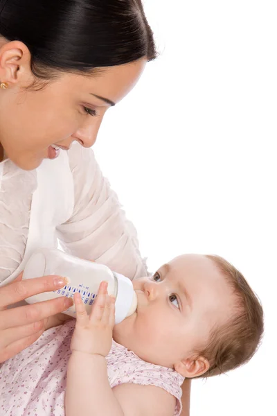 Mother feeding baby daughter — Stock Photo, Image