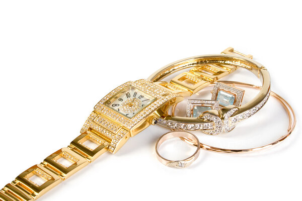 Golden clock and jewellery